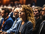 Audience Engaged in Focused Attention at a Professional Conference Event