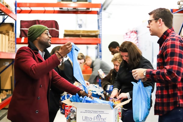 Jarrett employees working at a food bank making a difference in our community