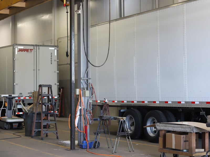 Warehouse with trucks being serviced