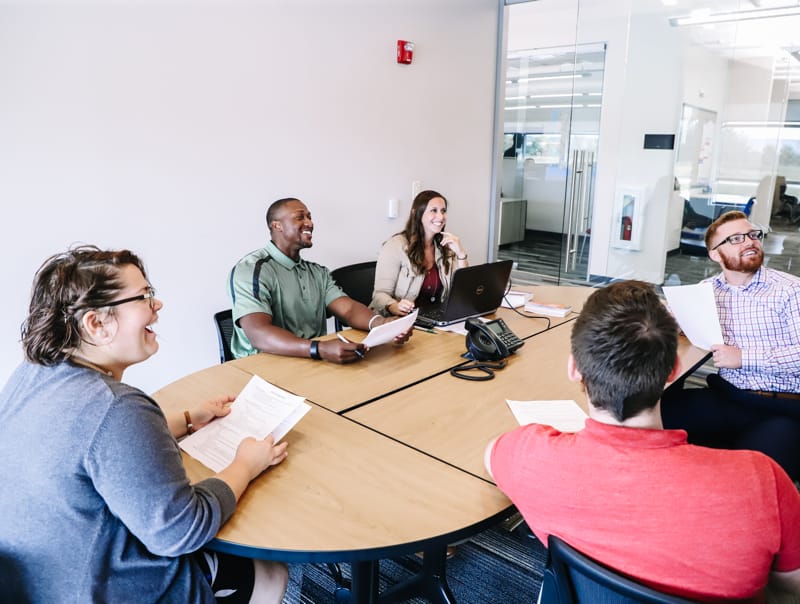 Jarrett logistics management experts having a meeting in a conference room