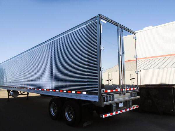 Trailer repaired by Jarrett Fleet Services with body work and trailer painting to match