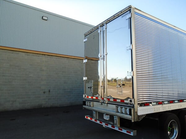 Close-up of semi-truck trailer rear door that had truck and trailer repair and fleet painting services